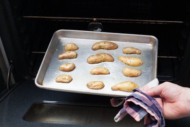 Roast the potatoes:
