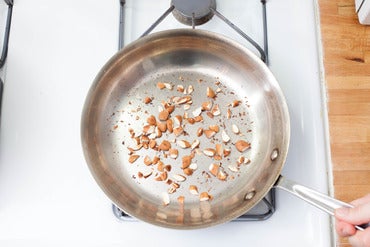 Toast the almonds: