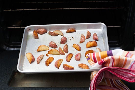 Roast the potatoes: