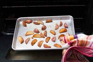 Roast the potatoes:
