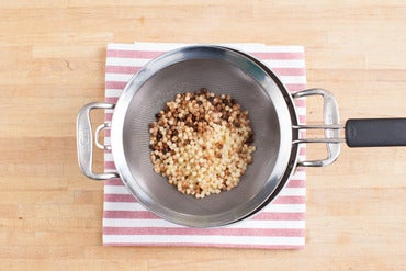 Cook the fregola sarda: