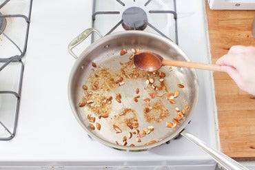 Toast the almonds: