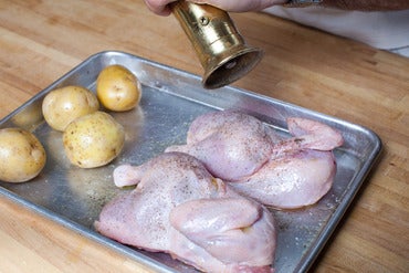 Roast the Cornish hen & potatoes: