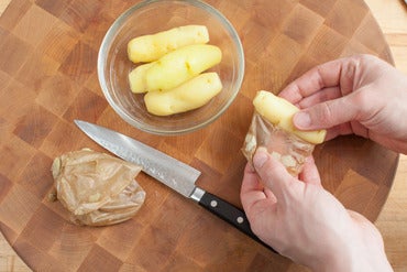 Cook & peel the potatoes: