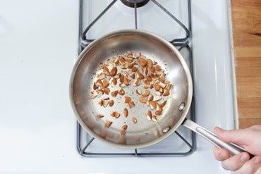 Toast the almonds: