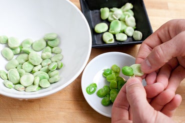 Cook the carrots & peel the fava beans: