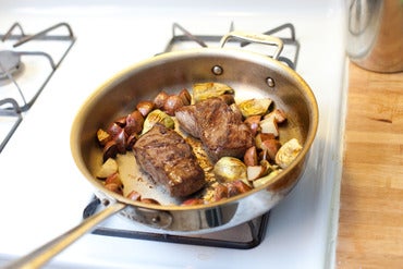 Add the artichokes:
