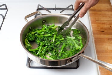 Cook the broccoli rabe: