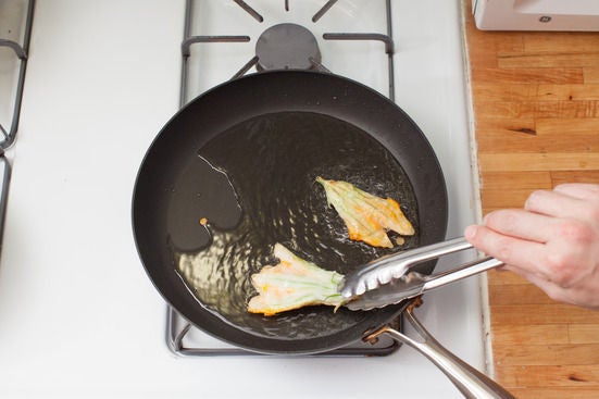 Fry the squash blossoms: