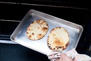 Warm the naan: