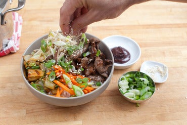 Assemble the bibimbap: