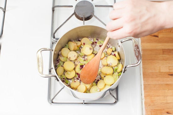 Start cooking the vegetables: