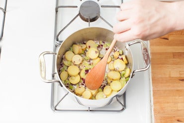 Start cooking the vegetables: