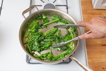 Cook the garlic & broccoli rabe: