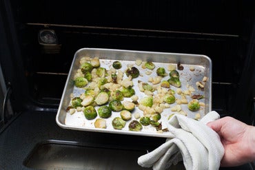 Render the bacon & roast the Brussels sprouts: