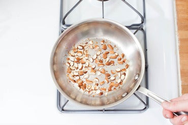 Toast the almonds: