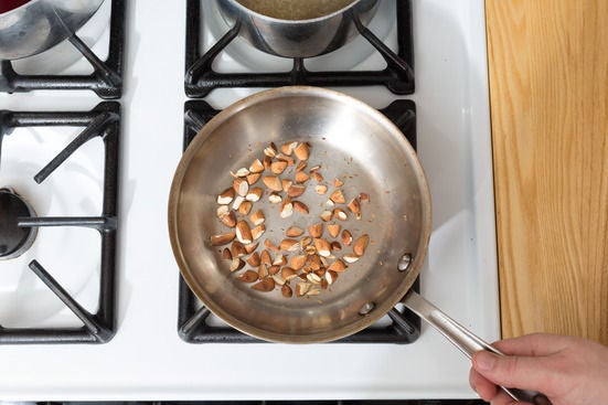 Toast the almonds: