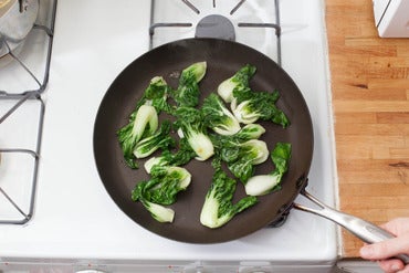 Cook the tatsoi and plate your dish: