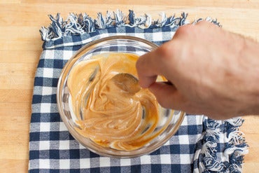 Make the hoisin mayo & toast the rolls: