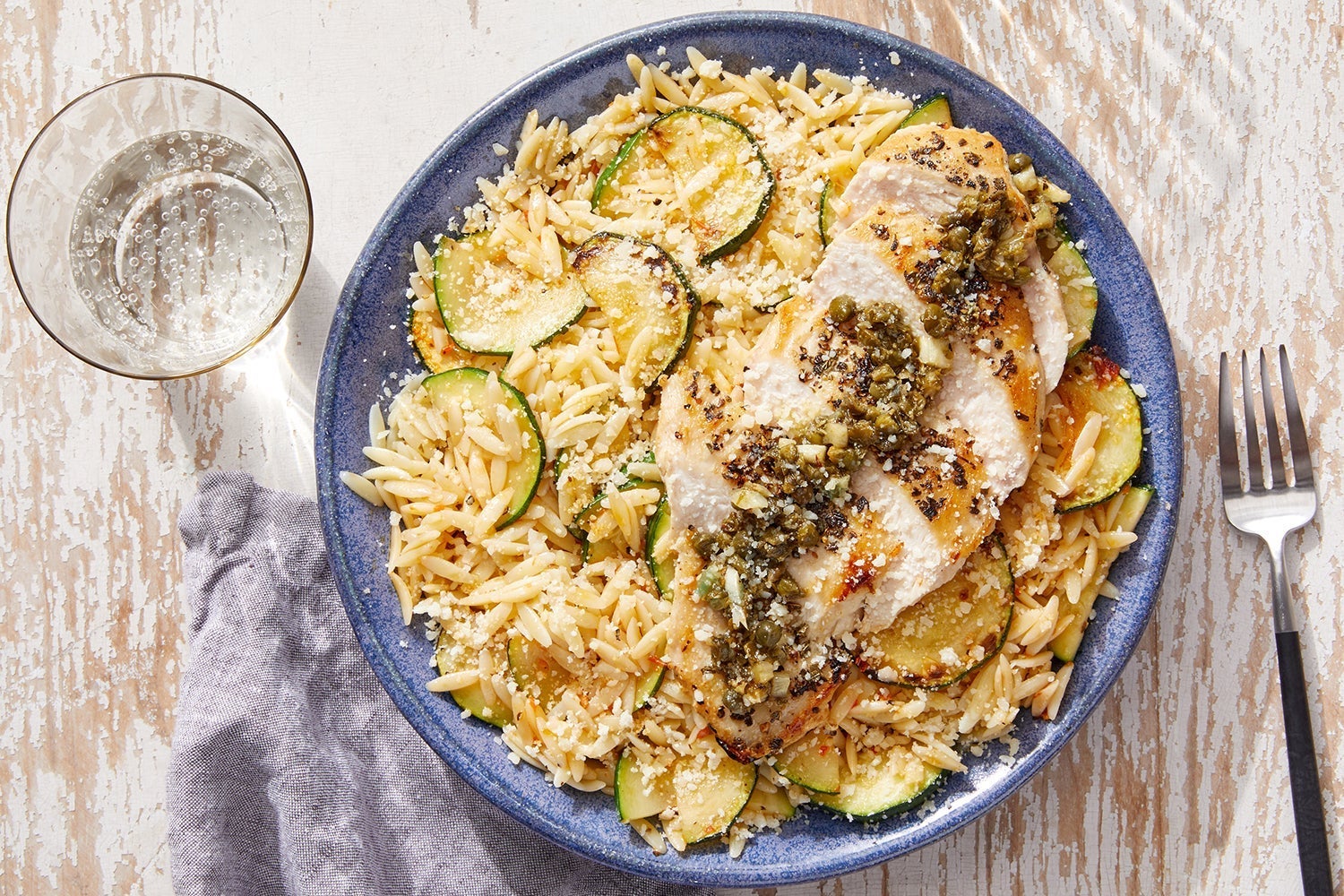 Recipe GarlicCaper Chicken with Creamy Calabrian Zucchini & Orzo