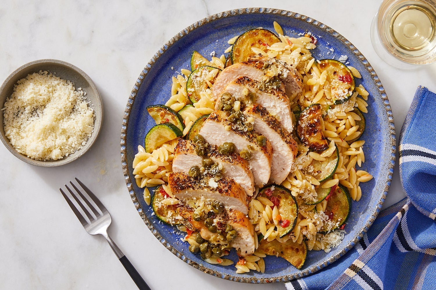 Recipe GarlicCaper Chicken with Creamy Calabrian Zucchini & Orzo