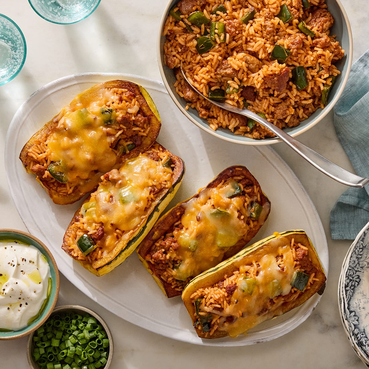 Recipe Cheesy Sausage Stuffed Delicata Squash with Rice & Lime Yogurt