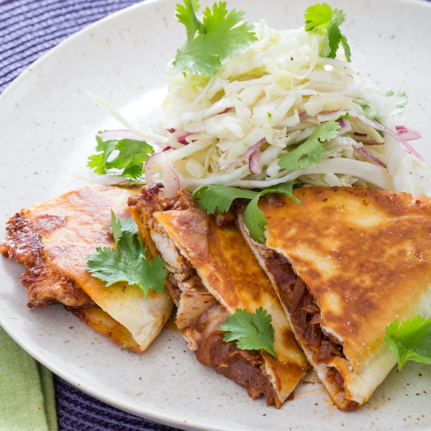 Recipe Pulled Chicken Mole Quesadillas With Monterey Jack Cheese Shredded Cabbage Salad Blue Apron Brush one side of tortillas with butter. pulled chicken mole quesadillas with monterey jack cheese shredded cabbage salad