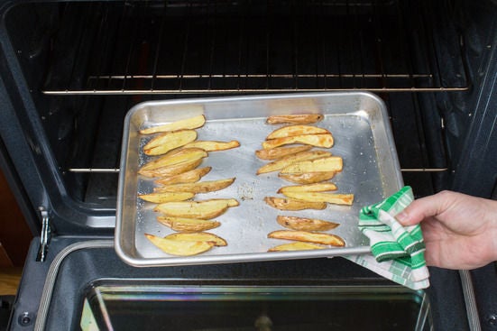 Roast the potatoes: