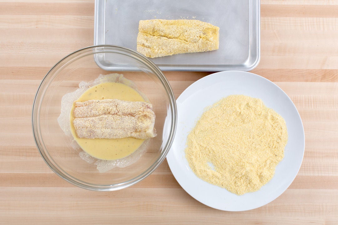 Recipe CornmealCrusted Catfish with TomatoCucumber Salad & Creamy