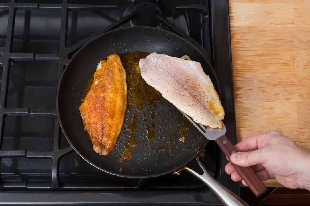 Recipe Spiced Catfish & PoblanoCheddar Grits with Stewed Collard