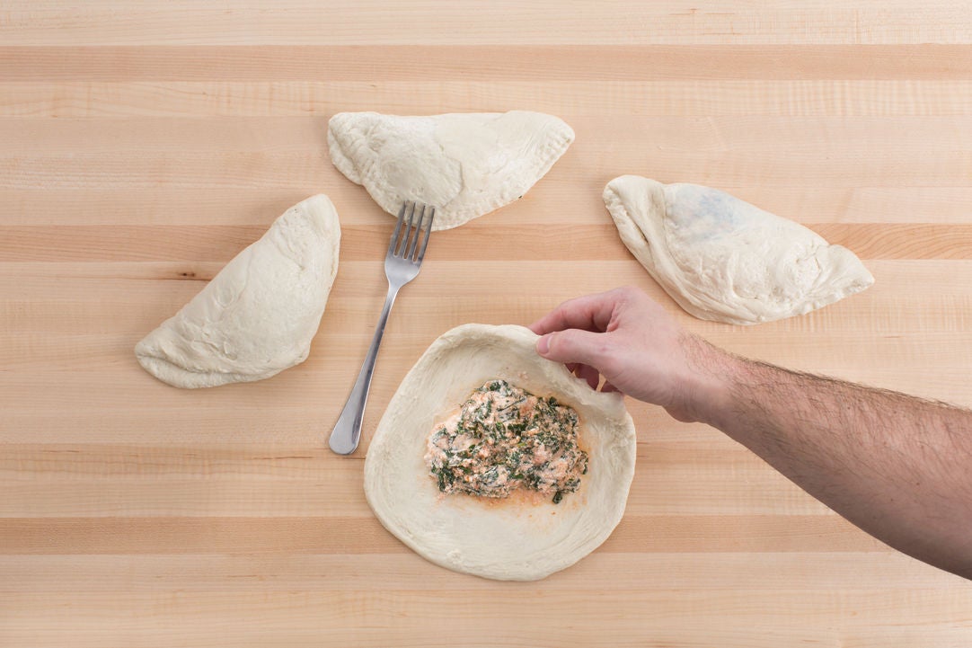 Recipe Kale & Ricotta Calzones with Blood Orange & Arugula Salad