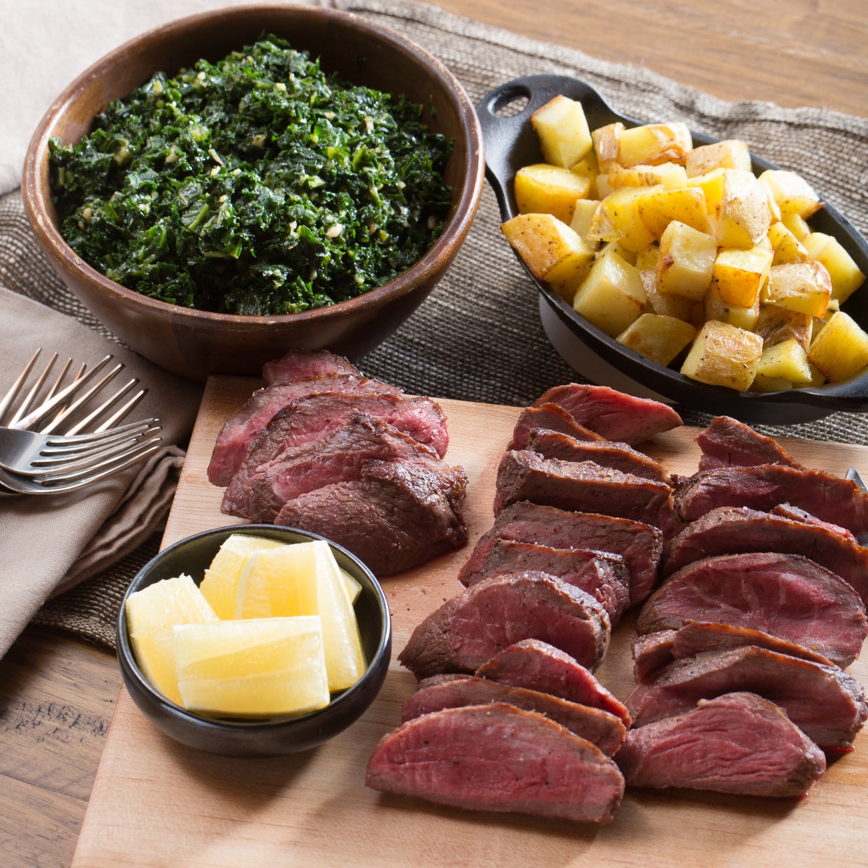 Recipe Seared Sirloin Steaks with Roasted Potatoes & "Creamed" Kale Blue Apron