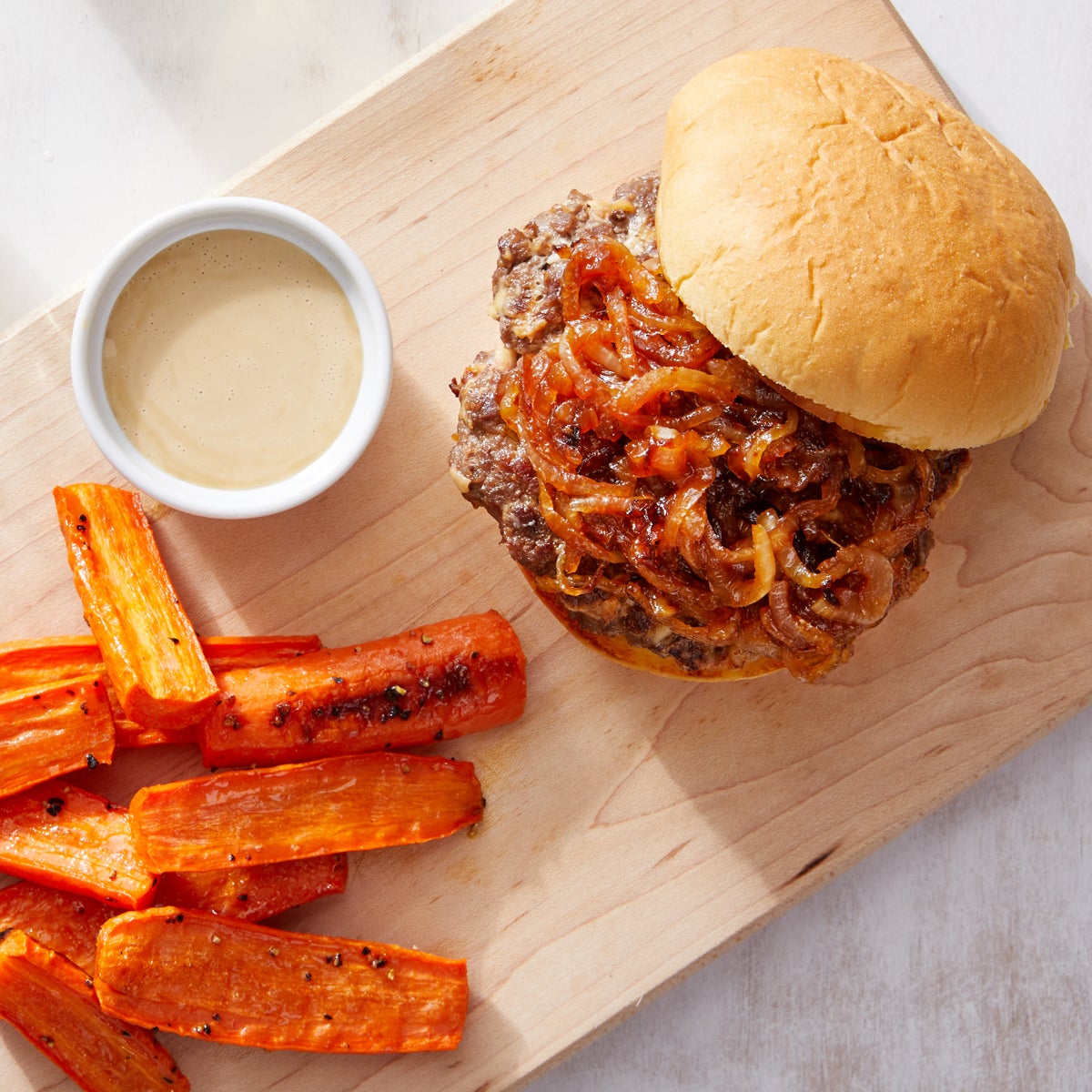 Smoked Gouda Burgers with Caramelized Onion & Roasted Carrots