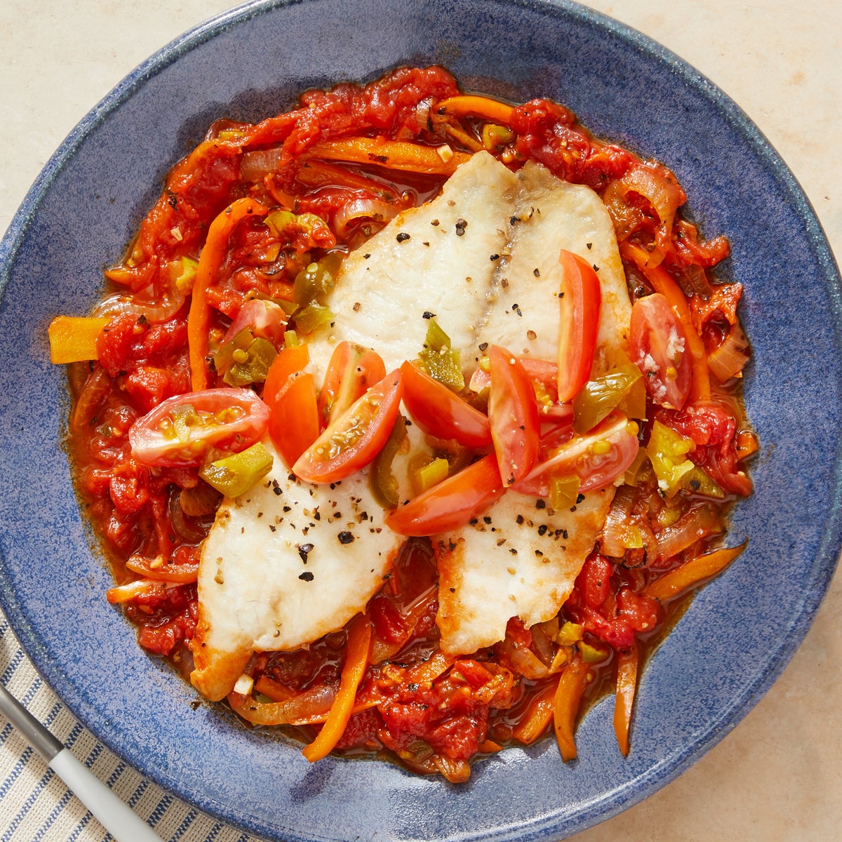 Recipe ShallowPoached Tilapia with Peppers, Onions & San Marzano