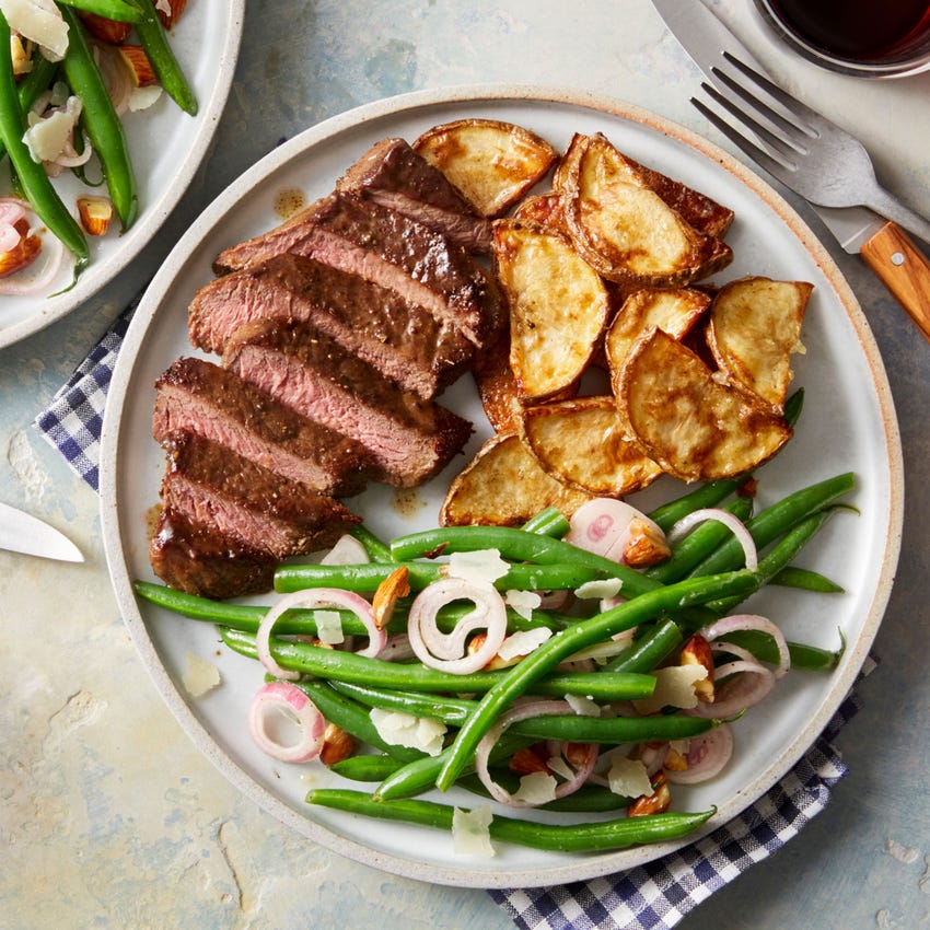 Recipe FennelSpiced Steaks with Garlic Roasted Potato & Green Bean