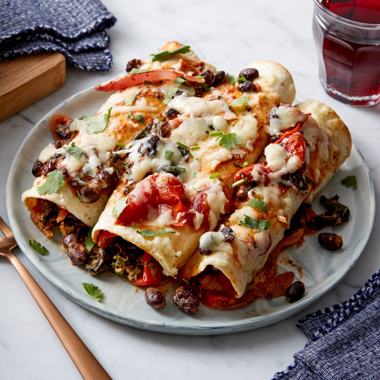 Recipe Spicy Black Bean & Kale Enchiladas with Cheddar Cheese Blue Apron