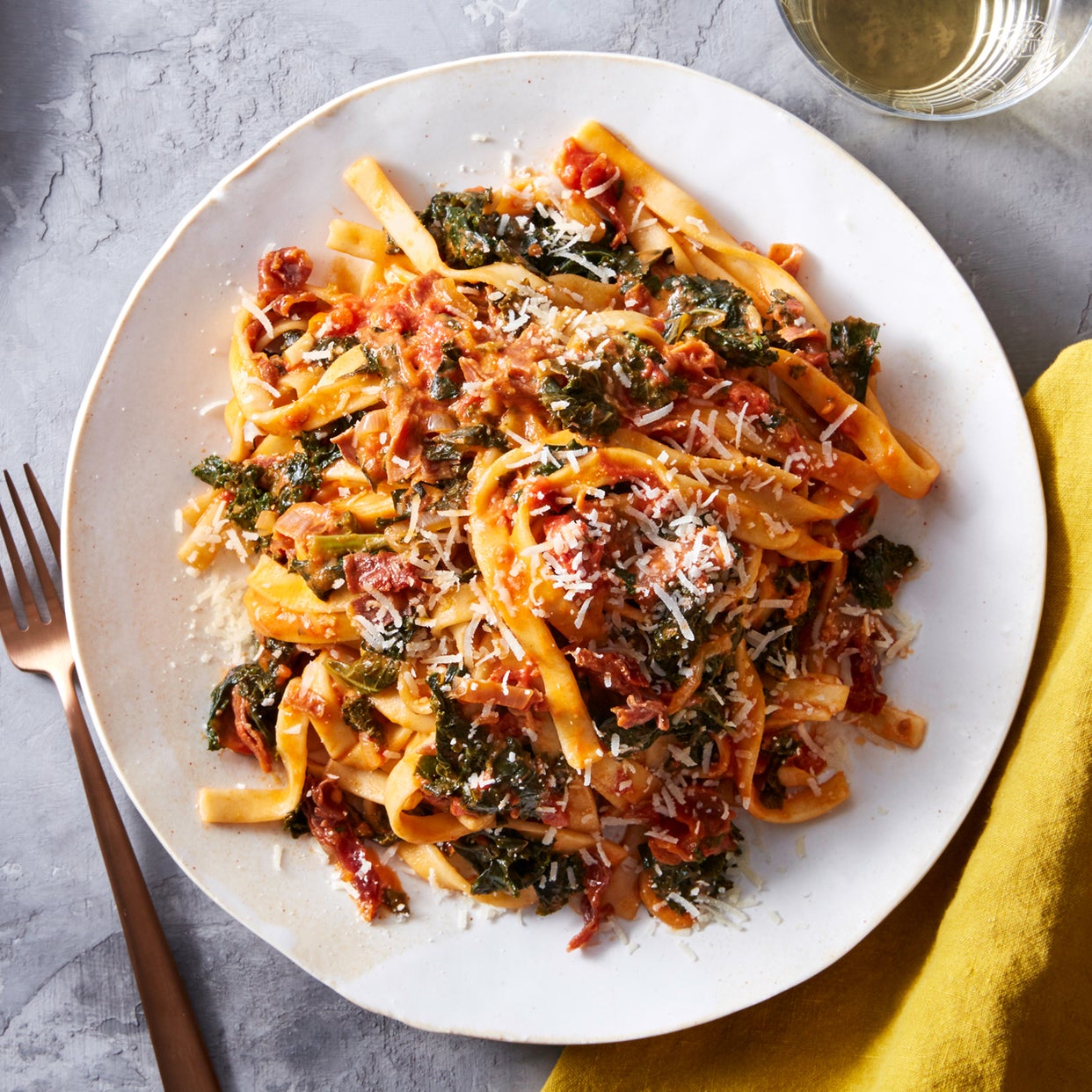 Recipe Fresh Fettuccine & Prosciutto with Kale & Tomato Sauce Blue Apron