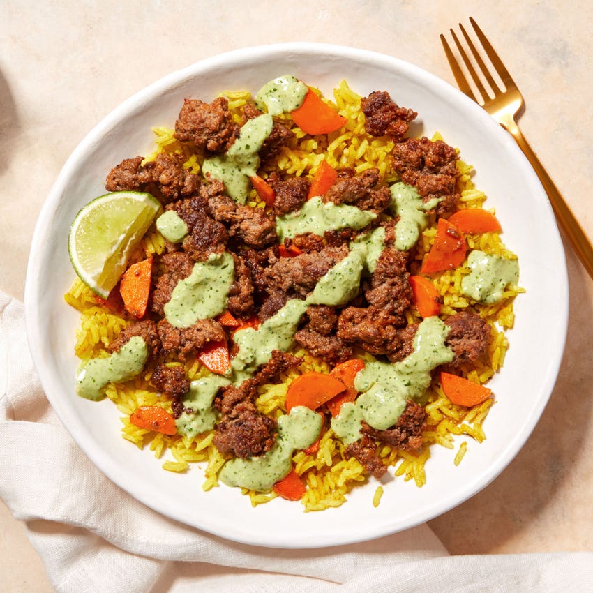 Beef over Curry-Spiced Rice with Creamy Cilantro Sauce