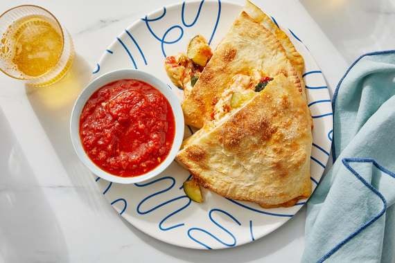 Three-Cheese Calzones with Zucchini & Golden Raisins-image