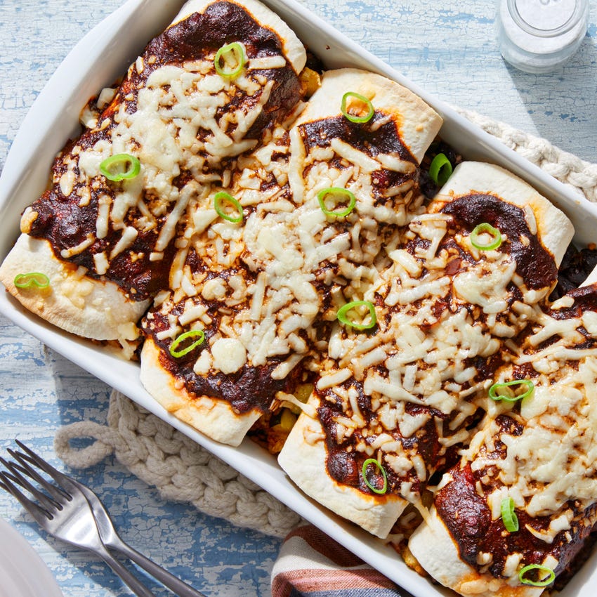 Recipe Black Bean & Zucchini Enchiladas with Cheddar Cheese Blue Apron