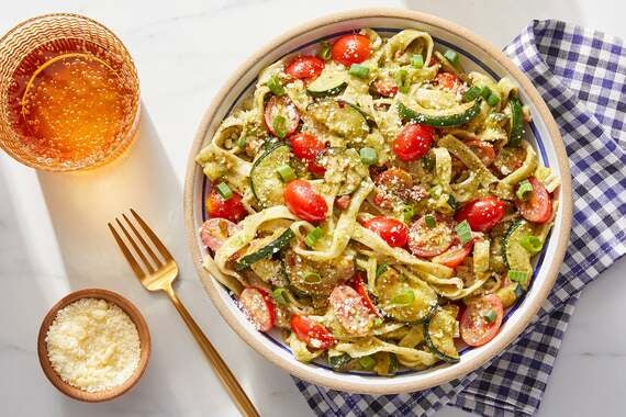 Pesto Pasta with Fresh Tomatoes & Parmesan Cheese-image