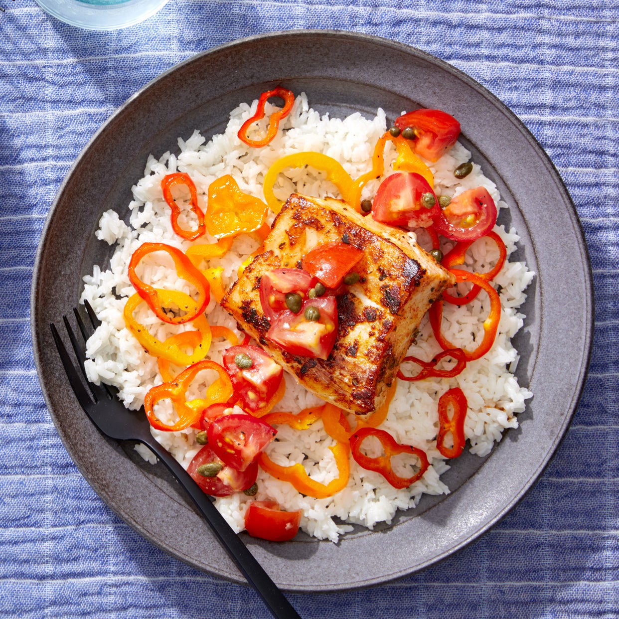 Recipe Seared Cod & Peppers over Creamy Rice with Marinated Tomatoes