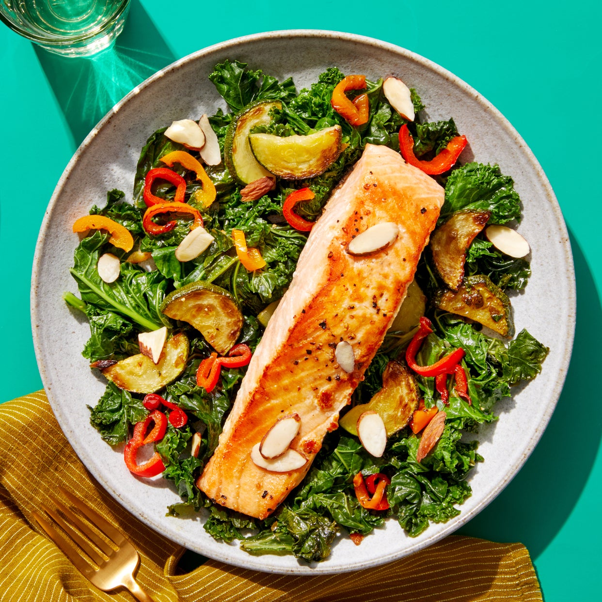 Recipe Mediterranean Salmon with Sautéed Kale & Zucchini Blue Apron
