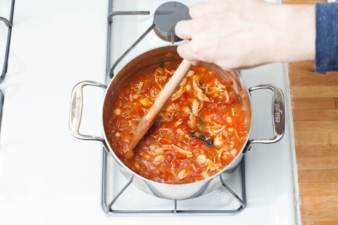 recipe: chicken tortilla soup with hominy, avocado & queso