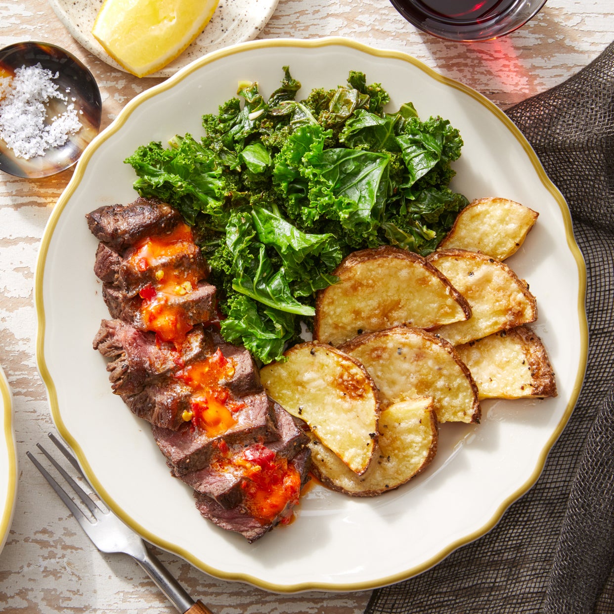 Recipe Seared Steaks & Garlic Kale with Cheesy Roasted Potatoes Blue Apron