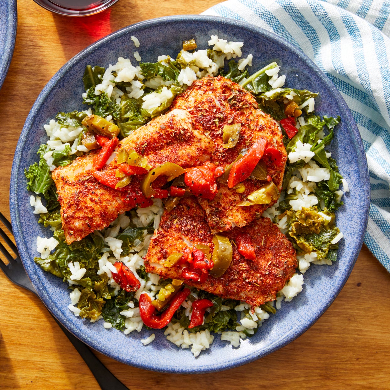 Recipe CajunSpiced Fish with Kale Rice & Pepper Topping Blue Apron