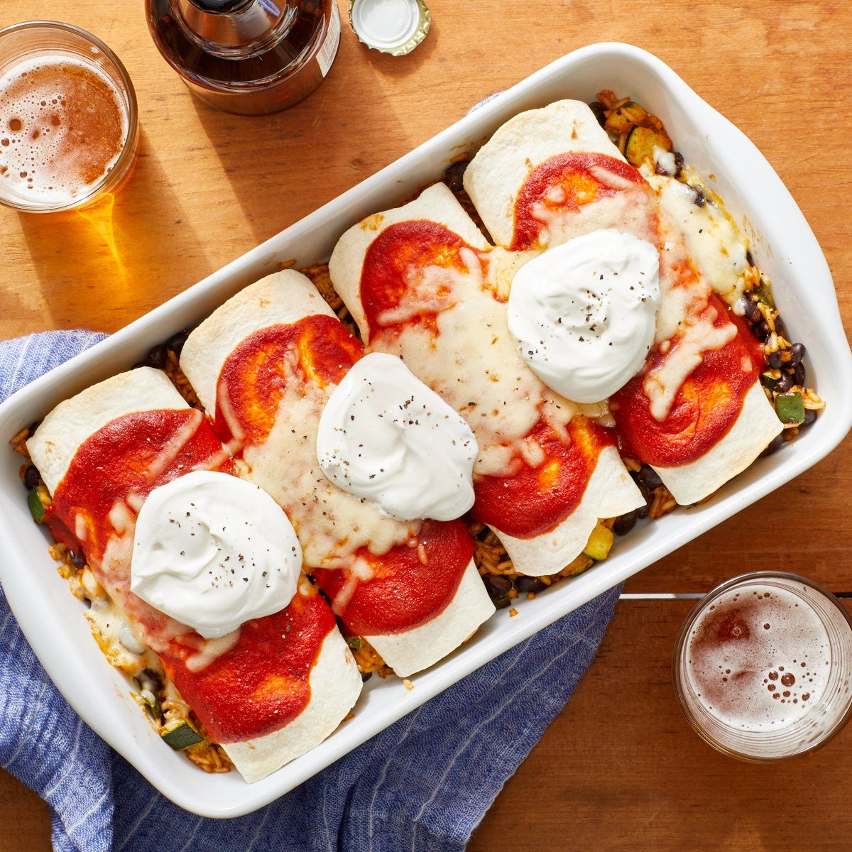 Recipe Cheesy Vegetable Enchiladas with Black Beans, Zucchini & Rice