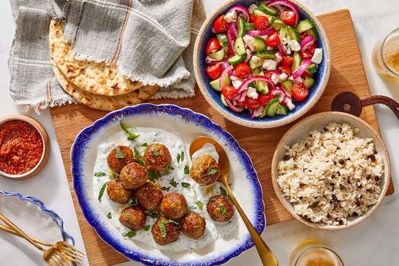 Greek-Style Lamb Meatball Platter with Pitas, Lemon-Currant Rice & Cucumber Salad-image