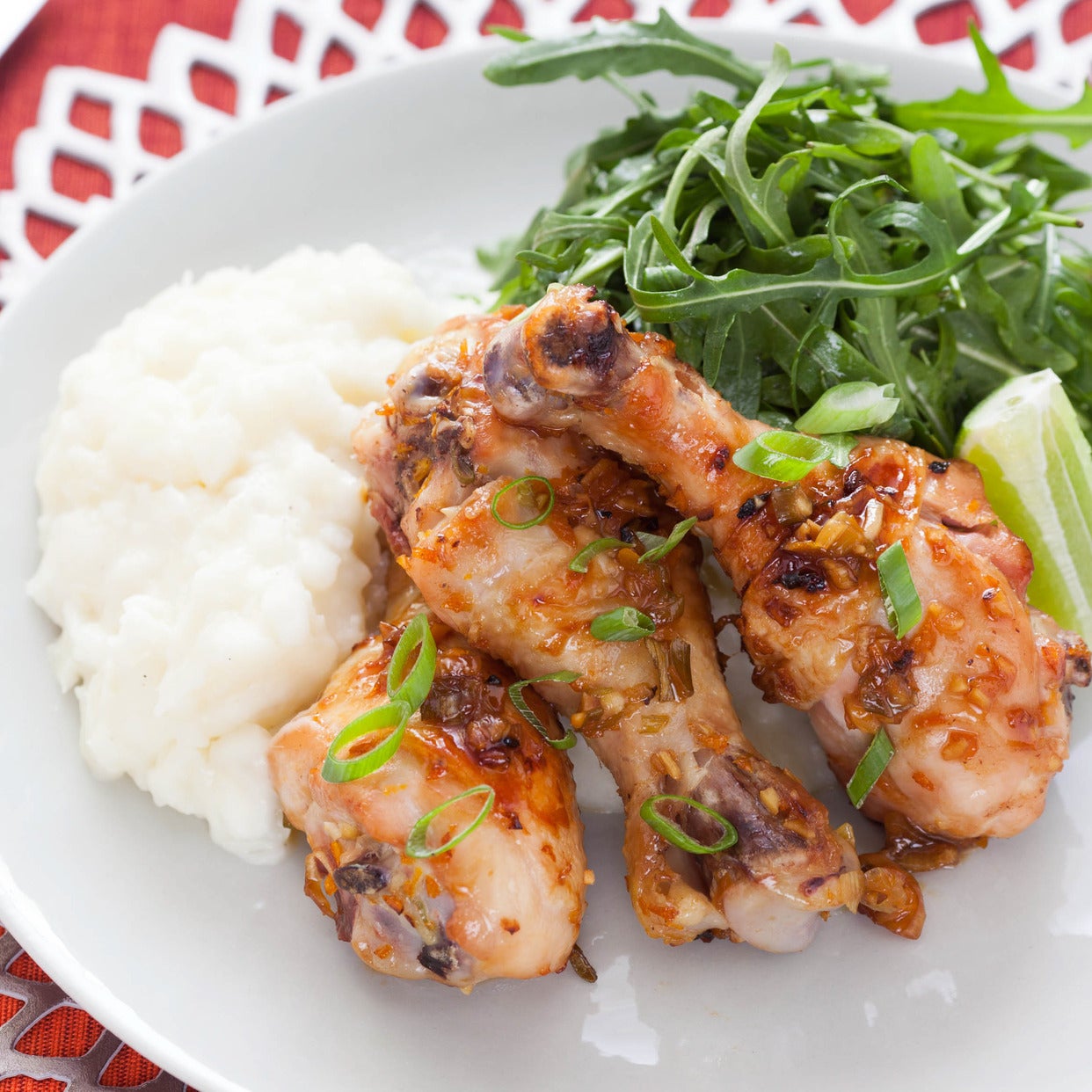 Recipe OrangeGlazed Chicken Drumsticks with Mashed Yucca & Arugula